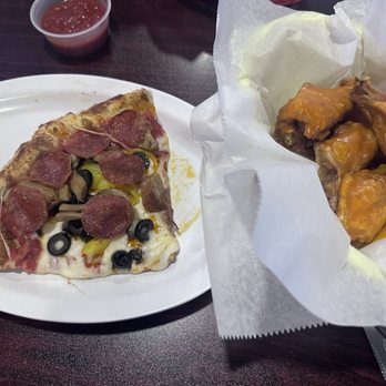 Brooklyn Bar and Grill - Slice pizza & bone in wings from lunch menu. - Bars Near Me - Crestview, Florida