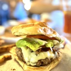 Cristy's Madison, Restaurant & Bar - Burger with bacon, American cheese, lettuce & tomato.