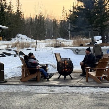 Vue North - Resort patrons enjoying a winters  fire - American Near Me - Two Harbors, Minnesota