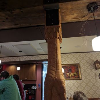 Kachka - Cool carved post and massive wooden beam. - Russian Near Me - Portland, Oregon