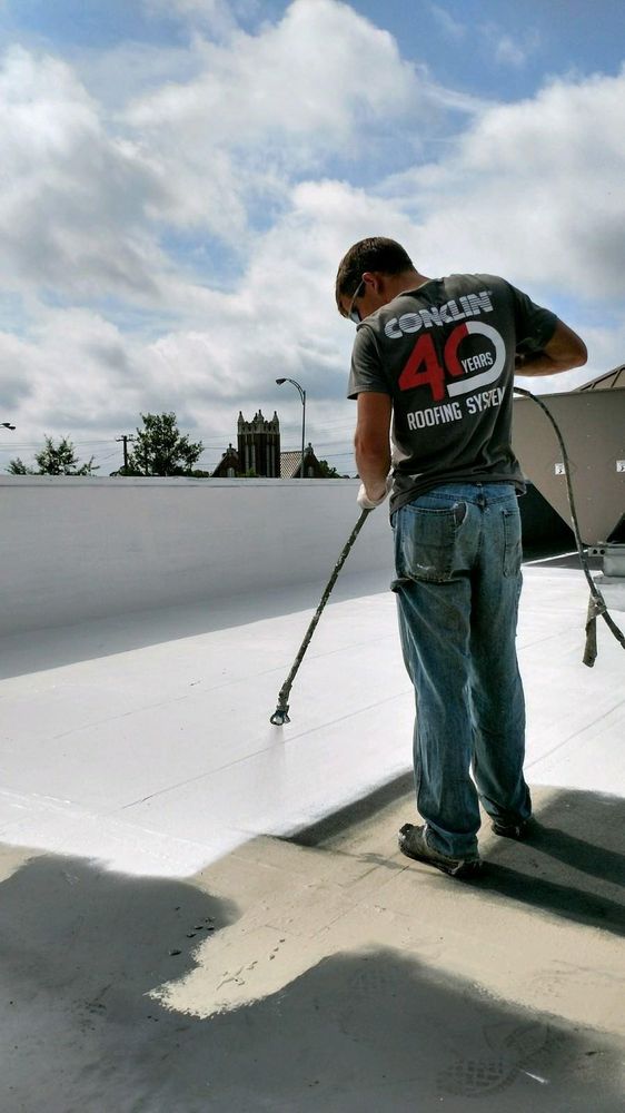 Slide of K & C Seamless Roofing