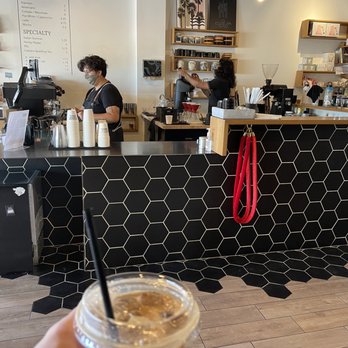 Steady State Roasting - a hand holding a cup of coffee - Coffee Roasteries Near Me - Carlsbad, California Steady State Roasting - a hand holding a cup of coffee - Coffee Roasteries Near Me - Carlsbad, California