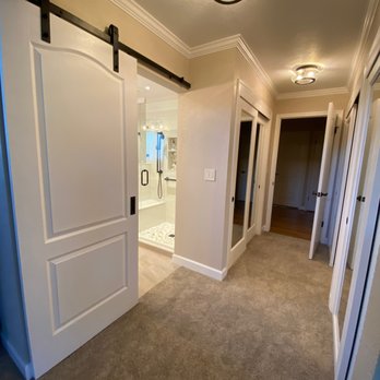 Boone Home Improvement - New closet doors, light fixtures and crown moulding give this previously very dark area, a very light and airy feeling. - General Contractors Near Me Boone Home Improvement - New closet doors, light fixtures and crown moulding give this previously very dark area, a very light and airy feeling. - General Contractors Near Me