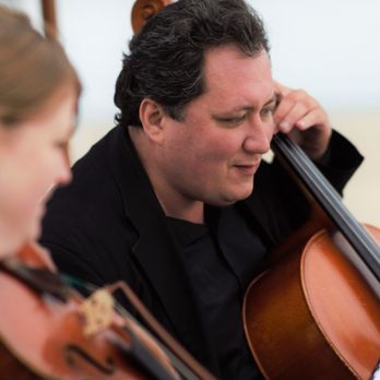 Subito Strings - Performing on the beach - Musicians Near Me Subito Strings - Performing on the beach - Musicians Near Me