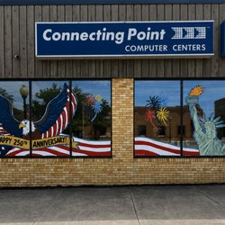 Connecting Point Computer Centers - Storefront celebrating America's 250th birthday of our business location.