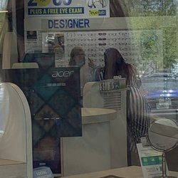 Stanton Optical - Manager and customer sans mask