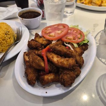 Malecon Restaurant - Fried Chicken Chunks came with rice and black beans - Dominican Near Me - New York, New York