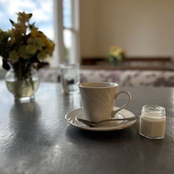 French Whisk - a cup and saucer on a table - Caterers Near Me - Sutter, California