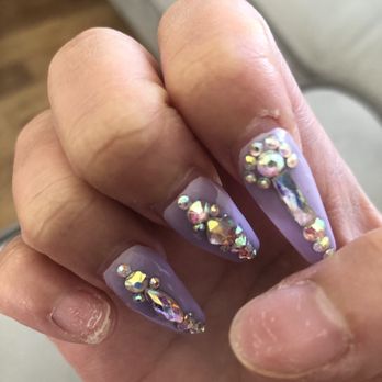 Kim's Nails and Spa - Two nails fell off, chipped paint and top of the nails popped out causing so much pain and I couldn't do anything. Only lasted over a week! - Nail Salons Near Me - Garden Grove, California