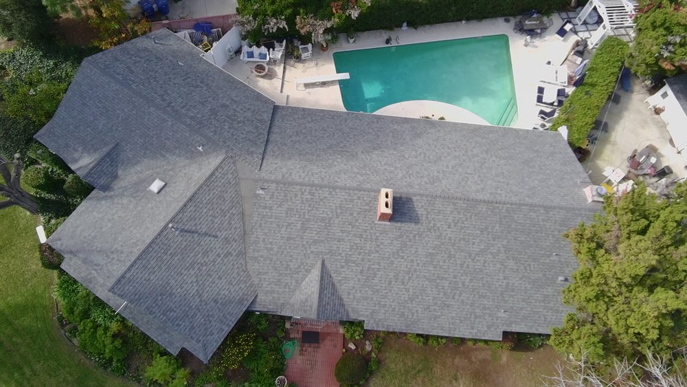 Slide of Queen Roofing