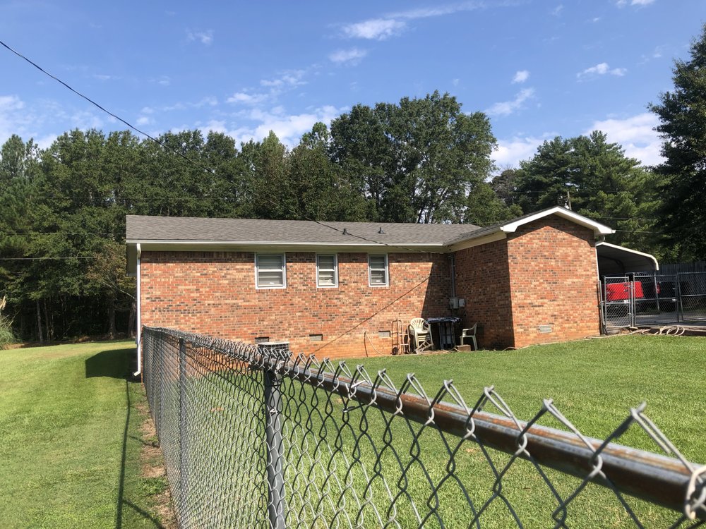 Slide of Roebuck Roofing