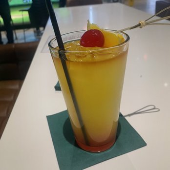 X-Golf - a glass of orange juice - Golf Near Me - Algonquin, Illinois