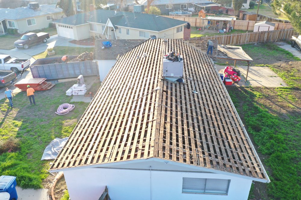 Slide of Roof Pros Roofing