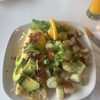 Bellini Cafe- Garberville - Bacon and avocado omelette with country potatoes. So good! - Breakfast & Brunch Near Me - Garberville, California
