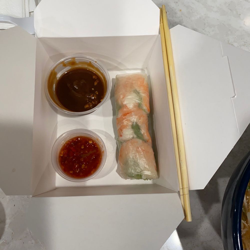 Q Tea Vietnamese Cafe - 1 of the 2 spring rolls.  See chopstick for size comparison.  (Big.) - Vietnamese Near Me - Arnold, Missouri