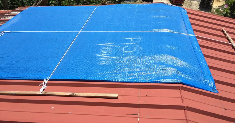 Slide of A&E Construction & Roofing Group