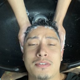 Getting my hair shampooed and washed before the hair cut at v salon.