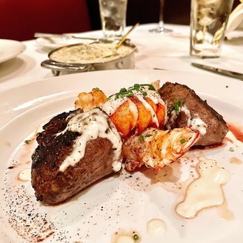 The Capital Grille - Seared Tenderloin with Butter Poached Lobster Tails | $57 - Steakhouses Near Me - Troy, Michigan