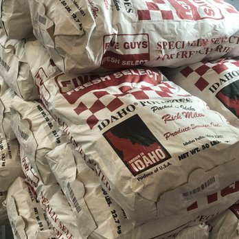 Five Guys - No chairs or tables but at least they still have the bags of Idaho potatoes! - Burgers Near Me - Renton, Washington Five Guys - No chairs or tables but at least they still have the bags of Idaho potatoes! - Burgers Near Me - Renton, Washington