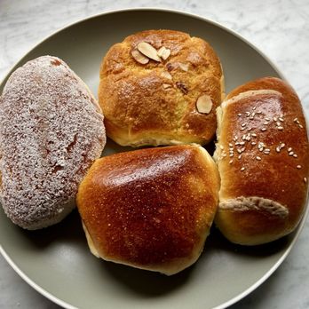 Lung Fung Bakery - From left to right clockwise. Milk cream bun, pineapple bun with BBQ pork, cocktail bun and BBQ pork bun. - Bakeries Near Me - San Francisco, California Lung Fung Bakery - From left to right clockwise. Milk cream bun, pineapple bun with BBQ pork, cocktail bun and BBQ pork bun. - Bakeries Near Me - San Francisco, California