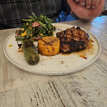 Tribe at Riverwalk - The pork chop is amazing!! Sweet potato flan was perfect side to the chop. - New American Near Me - Castle Rock, Colorado