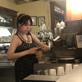Bluebird Ice Cream - Swiping a debit card with the same hands she's creating cones with - Ice Cream & Frozen Yogurt Near Me - Seattle, Washington