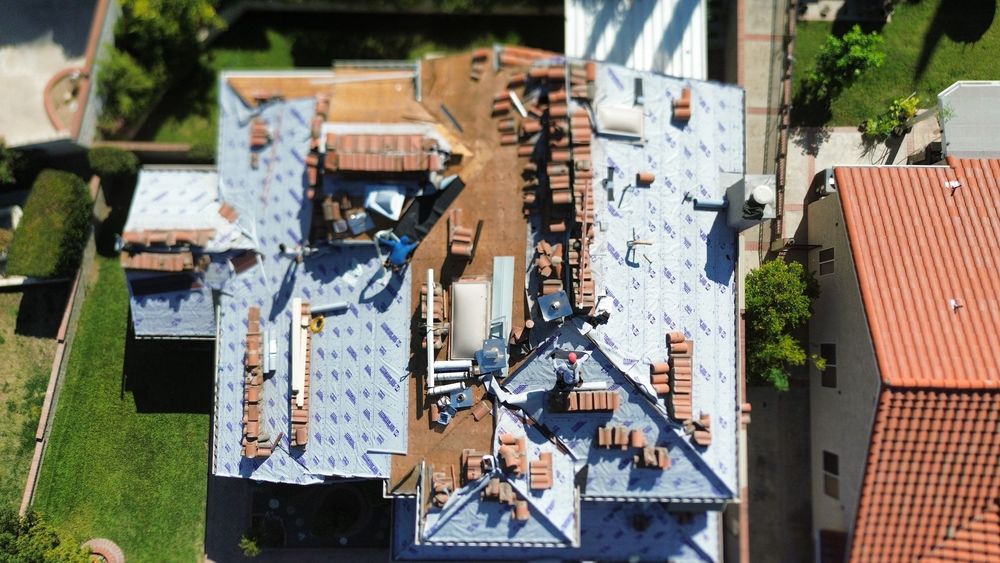 Slide of Pacific Roofers