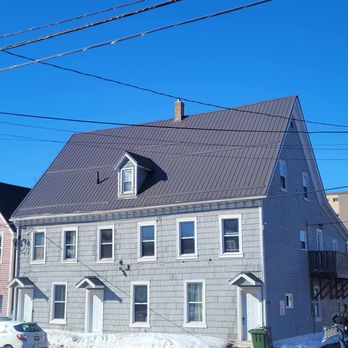 Envelopro - a row of houses on a snowy street - Roofing Near Me - Truro, Nova Scotia Envelopro - a row of houses on a snowy street - Roofing Near Me - Truro, Nova Scotia