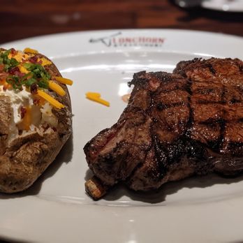 LongHorn Steakhouse - Outlaw Ribeye with loaded baked potato - Steakhouses Near Me - Boise, Idaho