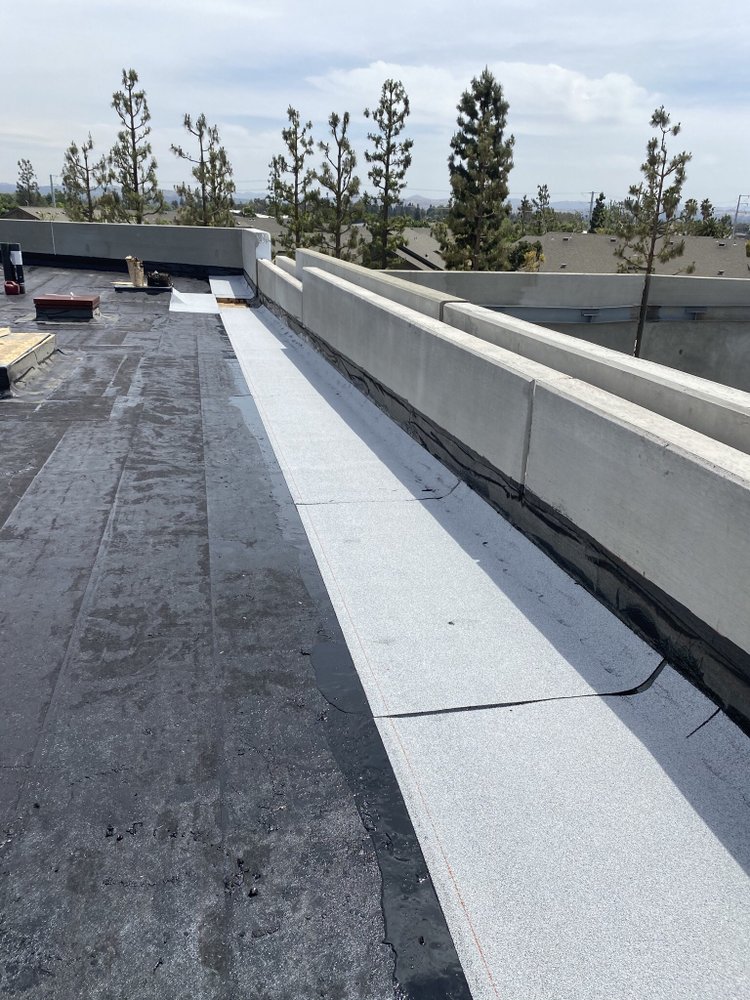 Slide of Torres Roofing