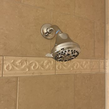 C Williams Plumbing - Close up of finished shower stem in wall. - Plumbing Near Me