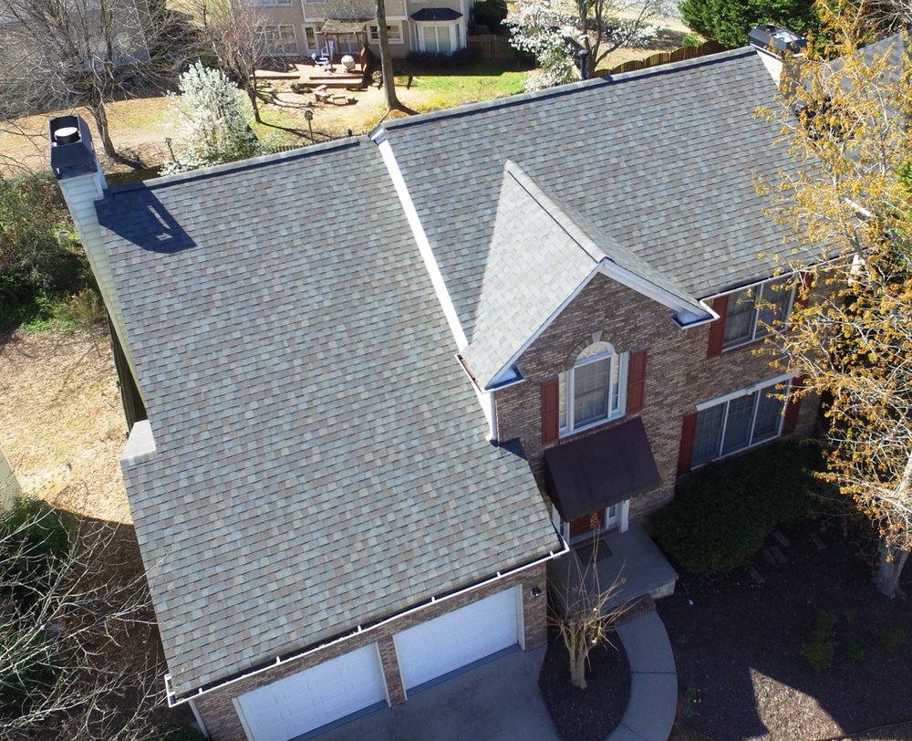 Slide of Excell Roofing & Renovations