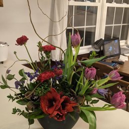 Amaryllis, orchid, ranunculus, clematis, double peony tulip, carnation, curly willow