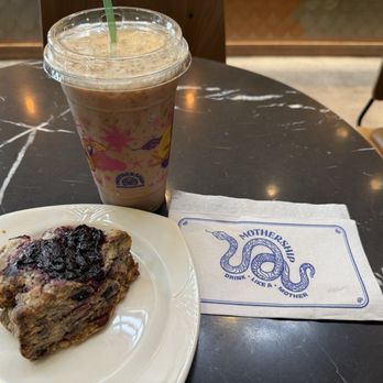 Mothership Coffee Roasters - Cherry Dark Mocha Cold Brew Latte with Blueberry Scone - Coffee & Tea Near Me - Henderson, Nevada Mothership Coffee Roasters - Cherry Dark Mocha Cold Brew Latte with Blueberry Scone - Coffee & Tea Near Me - Henderson, Nevada
