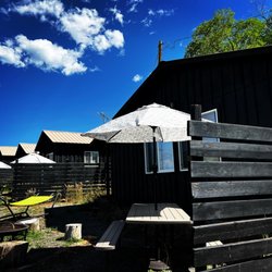 The Cabins of Grand Mesa - Each "backyard" has it's own picnic table, firepit & hammock