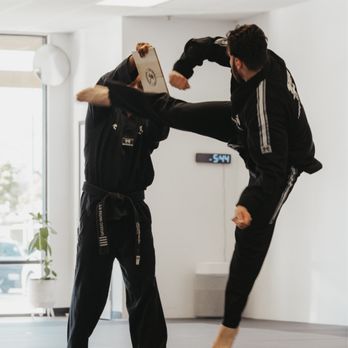 Beyond Martial Arts - Instructor Vahan demonstrating board breaking technique! - Martial Arts Near Me - Burbank, California