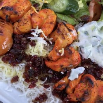 Upland Kabob - Zeresh polo with chicken barg and a side of mausto Khiar and salad - Middle Eastern Near Me - Upland, California