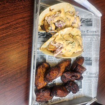 Soul Rebel - Pineapple jerk chicken tacos with fried plantains. - American Near Me - Petersburg, Virginia