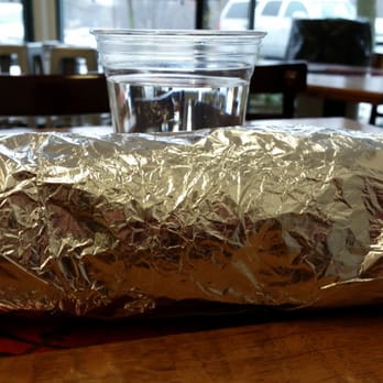 The Otherdoor - Thats a big burrito!!!! Cup of water behind for scale. Over 1 lb and bigger then all the other places! - Mexican Near Me - Lake Bluff, Illinois The Otherdoor - Thats a big burrito!!!! Cup of water behind for scale. Over 1 lb and bigger then all the other places! - Mexican Near Me - Lake Bluff, Illinois