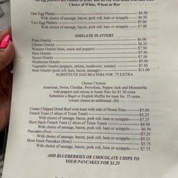 Menu - The menu from Coffee Cup Café in Pennsauken, PA, displays breakfast and brunch options including egg platters, omelettes, and pancakes. Prices range from $4.50 to $11.00, with options for add-ons like sausage, bacon, or pork roll. The menu also offers side dishes such as home fries, toast, and blueberry or chocolate chip pancakes, with additional charges for extras. The café emphasizes home-cooked meals and has been serving the community for over 20 years.