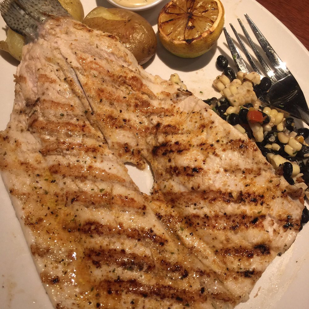 Seasons 52 - Rainbow trout, pressed potatoes, and sweet corn and black bean salsa. Delicious! - New American Near Me - Columbia, Maryland Seasons 52 - Rainbow trout, pressed potatoes, and sweet corn and black bean salsa. Delicious! - New American Near Me - Columbia, Maryland