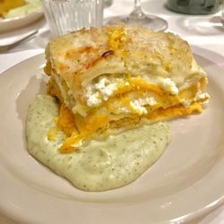 Cannova's Pizza - From the 2023 holiday musical show menu: Course 3 -- butternut squash lasagna with burre blanc