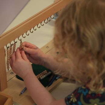 Pacific First Montessori - Team bead frame - Montessori Schools Near Me - Seattle, Washington Pacific First Montessori - Team bead frame - Montessori Schools Near Me - Seattle, Washington