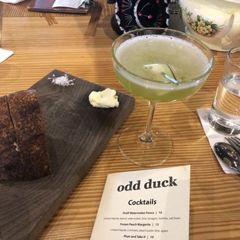 Odd Duck - Sourdough bread and Weekend at C-B cocktail - American Near Me - Austin, Texas