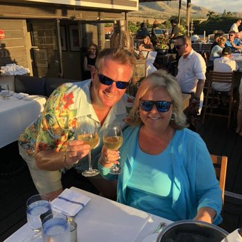 Fleetwood's on Front St - Sunset on the rooftop started with a Neyers Chardonnay. - New American Near Me - Lahaina, Hawaii