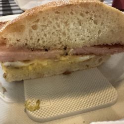 Dash's Market - Famous breakfast sandwich with pea meal & American cheese on an English muffin