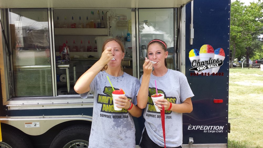 Charlie's Sno-Balls & Seasonal Tanning Logo