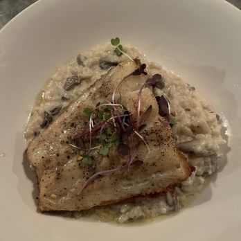 Vinatería - Mushroom risotto with wild caught cod - Italian Near Me - New York, New York Vinatería - Mushroom risotto with wild caught cod - Italian Near Me - New York, New York