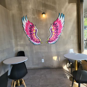 Over The Rainbow Tea Bar - a table and chairs - Bubble Tea Near Me - Bellevue, Washington