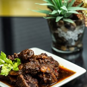 Caribbean Heritage Catering Services - Our #1 seller; succulent mouth watering, oxtail - Caterers Near Me - Rochester, New York Caribbean Heritage Catering Services - Our #1 seller; succulent mouth watering, oxtail - Caterers Near Me - Rochester, New York